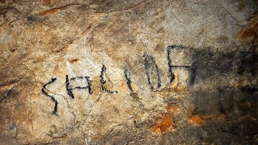 La palabra «Salida» sobre un bisonte en Aitzbitarte